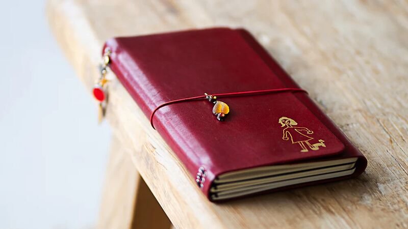 Hand-bound leather notebook at Louise Carmen